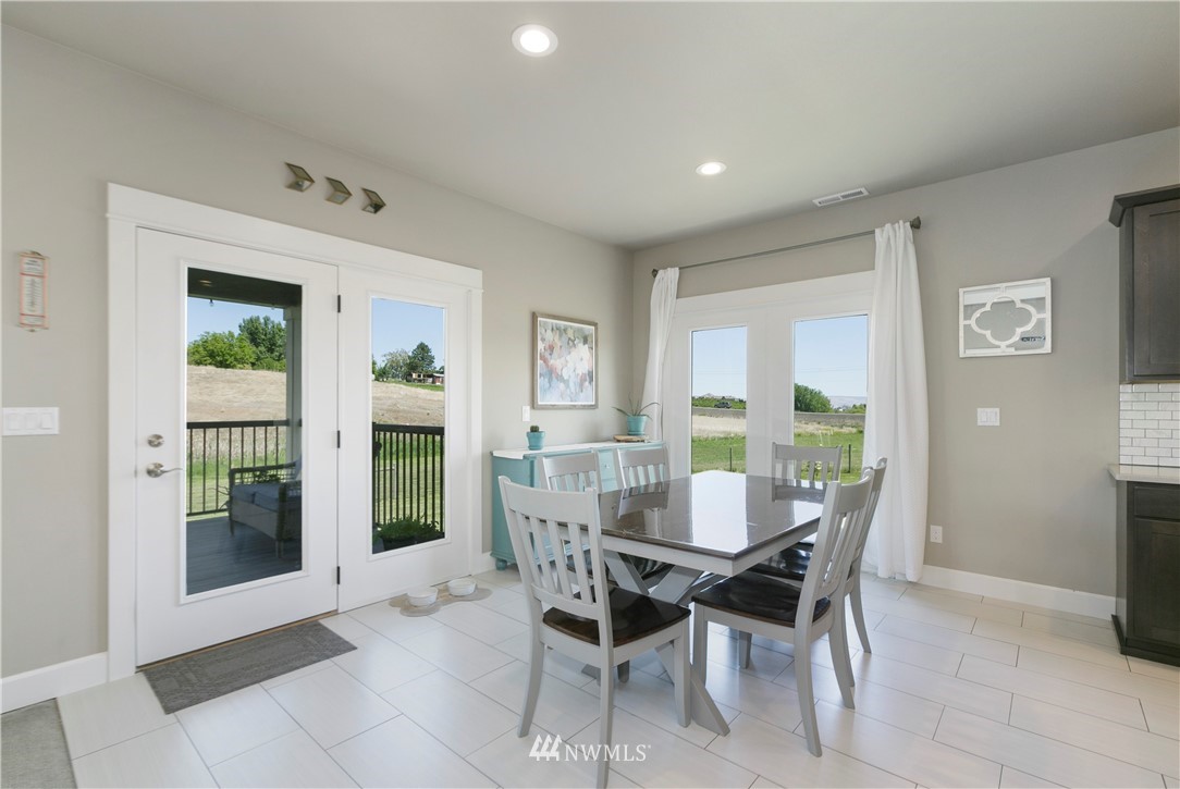 11301 Stump Road Yakima, WA 98908 - Photo 12 of 24 a dining room with furniture and large windows