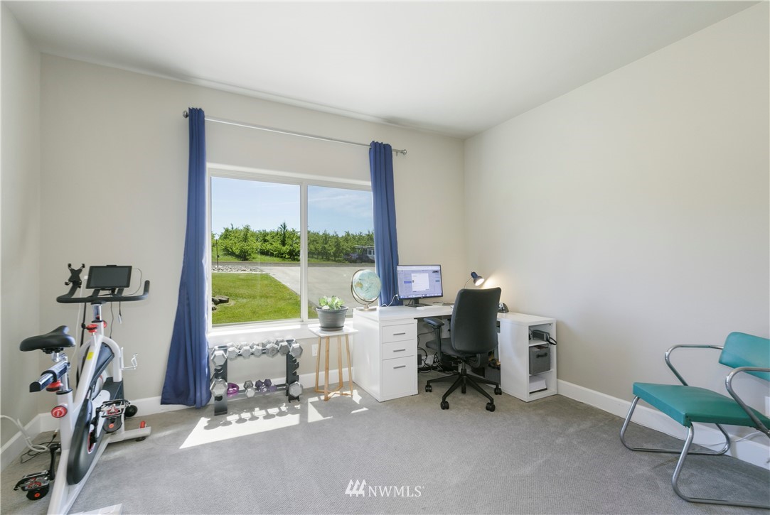 11301 Stump Road Yakima, WA 98908 - Photo 23 of 24 a view of a workspace with furniture and a gate