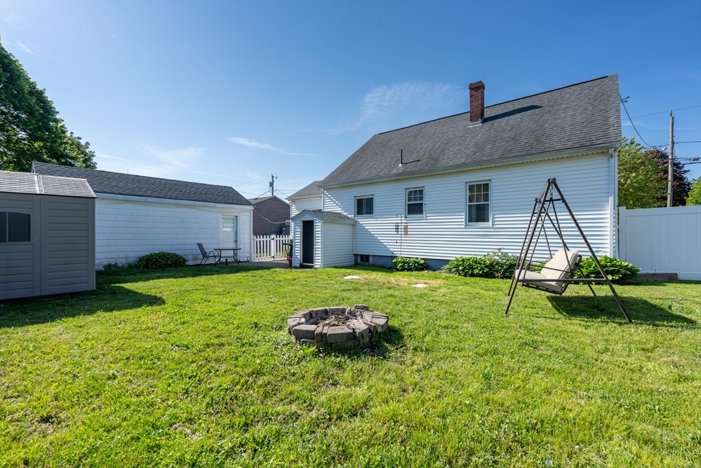 110 James M Beardsworth Road Tiverton, RI 02878 - Photo 22 of 26 a front view of house with yard and green space