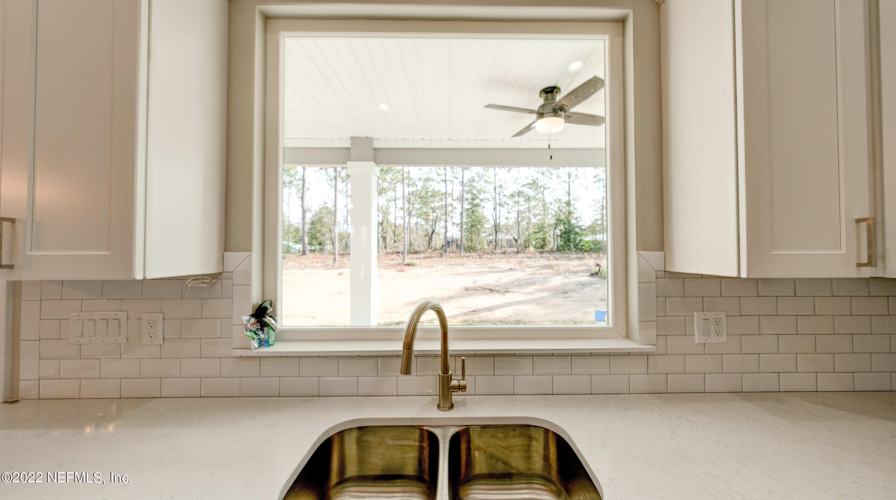 7615 Alameda Way Keystone Heights, FL 32656 - Photo 19 of 41 Picture window over the sink