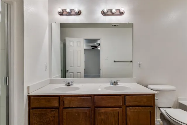 a bathroom with a sink and a toilet