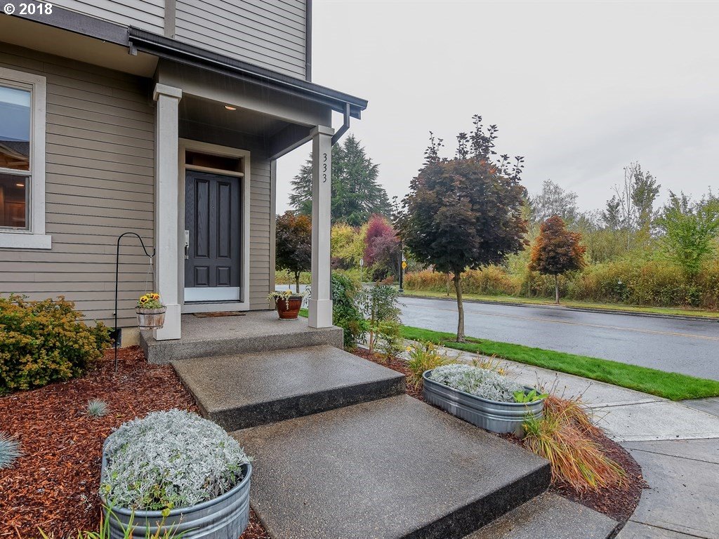 333 North 33rd Court Ridgefield, WA 98642 - Photo 2 of 24 a view of a backyard with sitting area