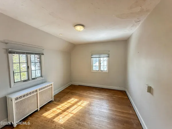 a view of a kitchen with dishwasher and a window