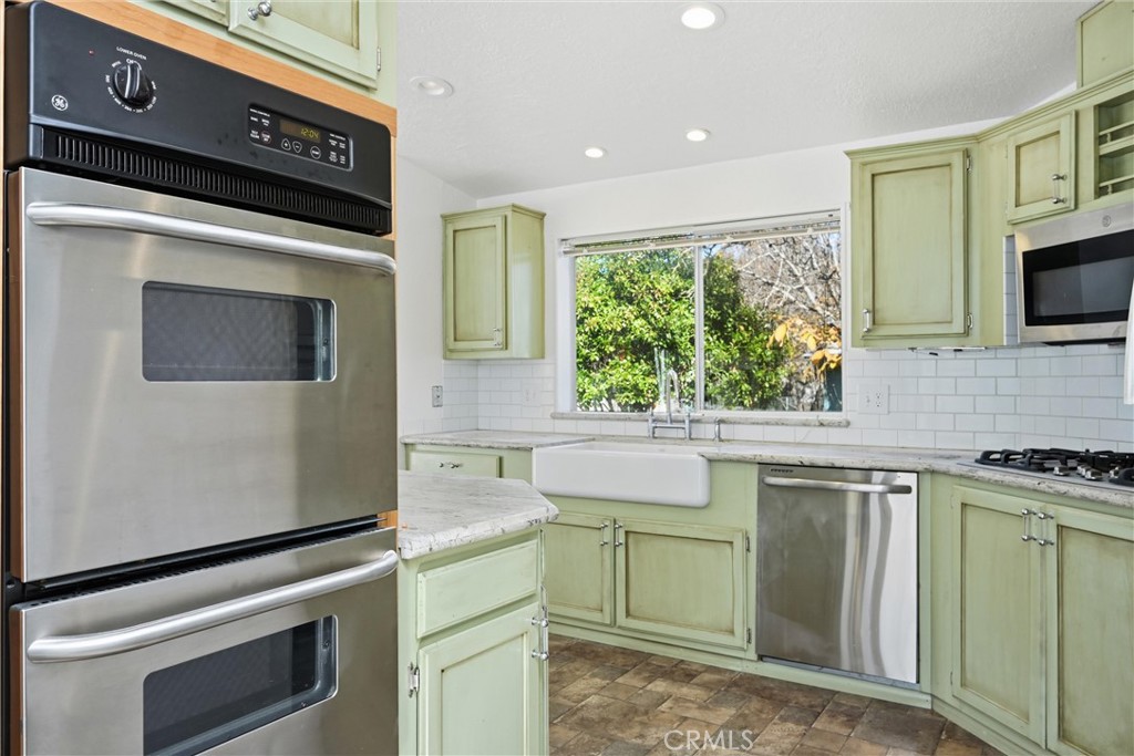 6763 Collier Avenue, Unit 10 Upper Lake, CA 95485 - Photo 11 of 35 a kitchen with a stove and a microwave