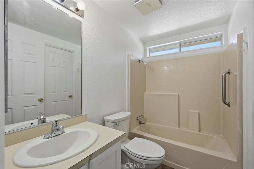 6763 Collier Avenue, Unit 10 Upper Lake, CA 95485 - Photo 16 of 35 a bathroom with a sink toilet a shower and bathtub