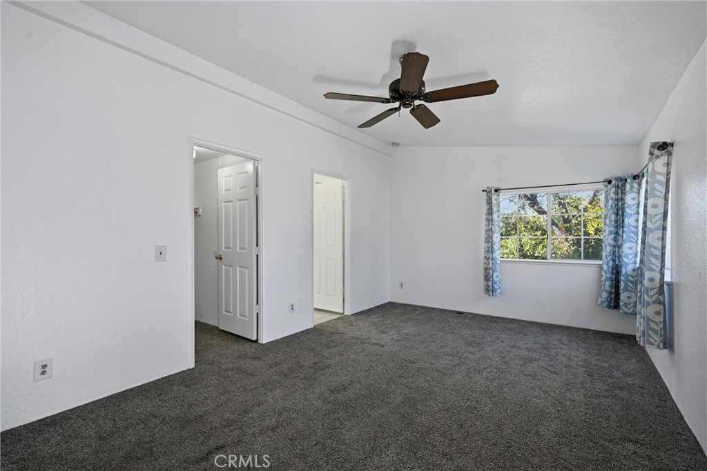 6763 Collier Avenue, Unit 10 Upper Lake, CA 95485 - Photo 18 of 35 a view of room with window and ceiling fan