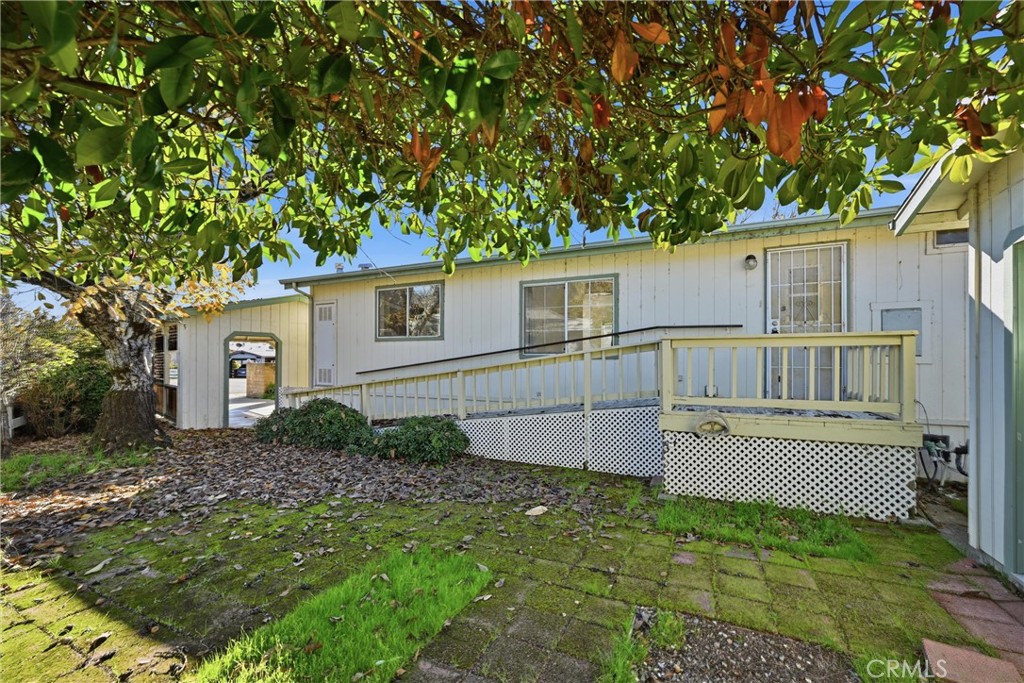 6763 Collier Avenue, Unit 10 Upper Lake, CA 95485 - Photo 29 of 35 a view of a house with a yard