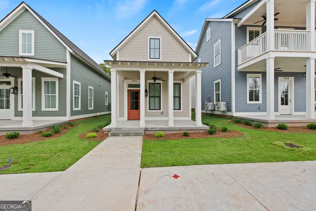 front view of a house and a yard