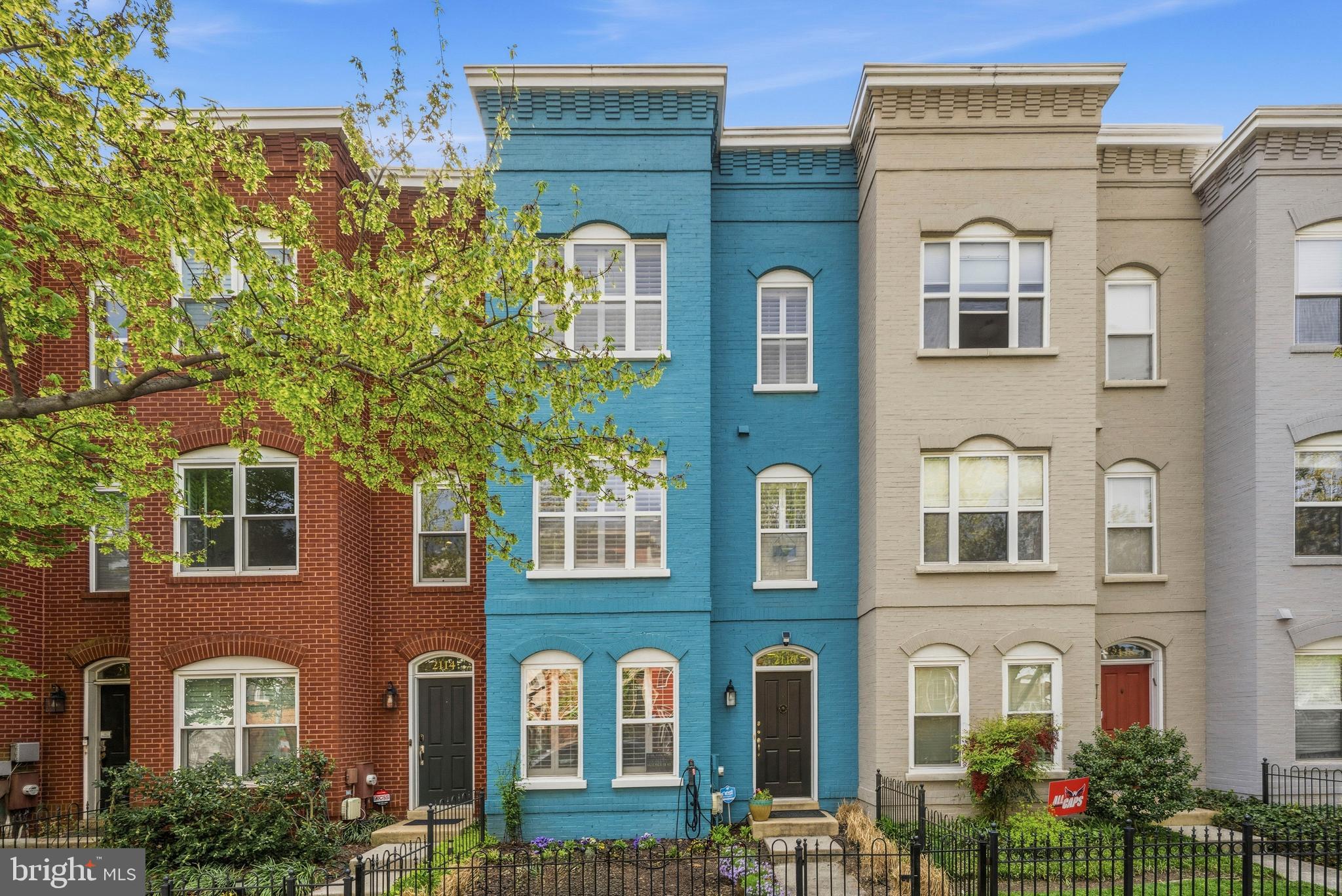 a front view of a multi story residential apartment building