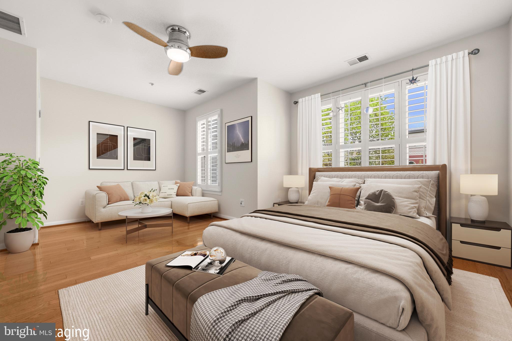 2116 12th Street Northwest Washington, DC 20009 - Photo 14 of 35 a bedroom with a bed couch and a large window