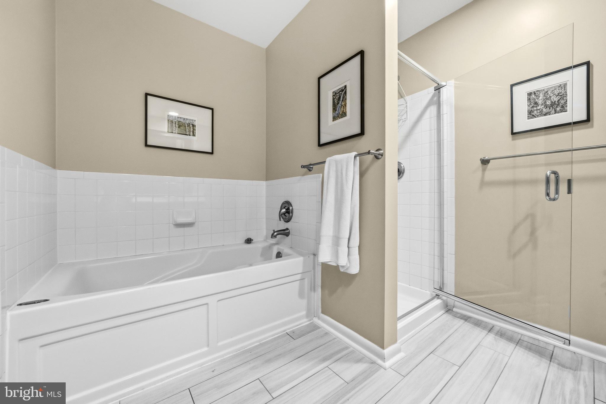 2116 12th Street Northwest Washington, DC 20009 - Photo 19 of 35 a bathroom with a bathtub and a shower