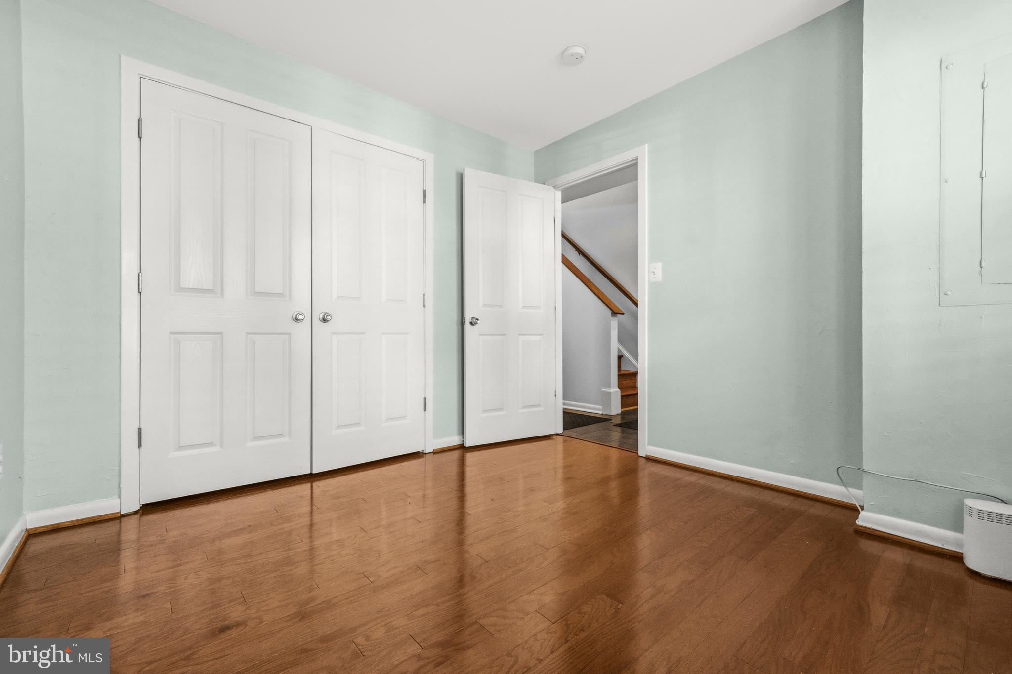 2116 12th Street Northwest Washington, DC 20009 - Photo 25 of 35 a view of an empty room with wooden floor