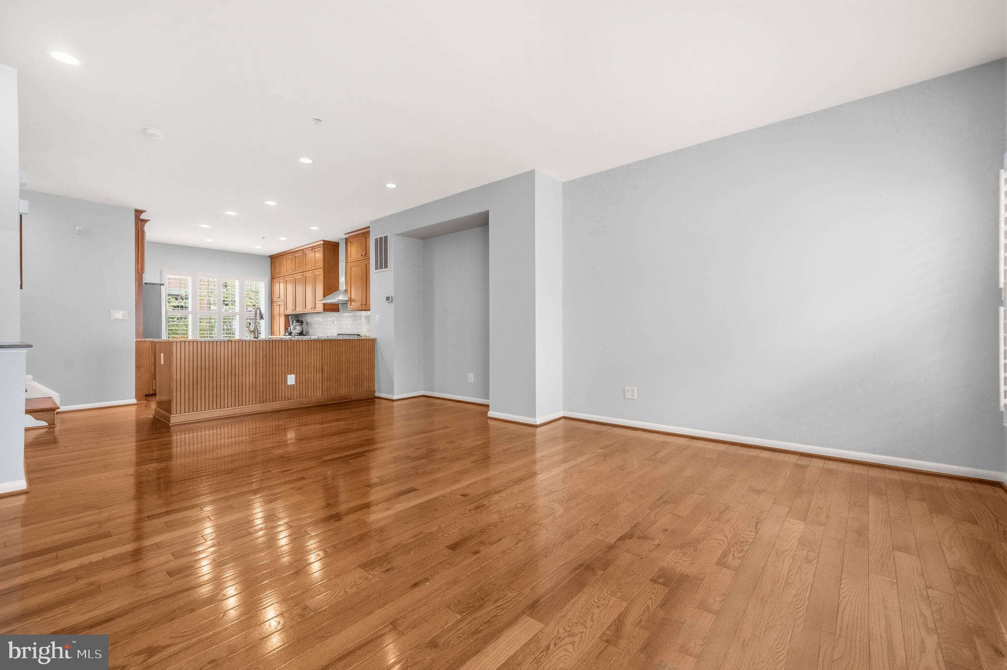 2116 12th Street Northwest Washington, DC 20009 - Photo 6 of 35 a view of a kitchen with a sink and a refrigerator
