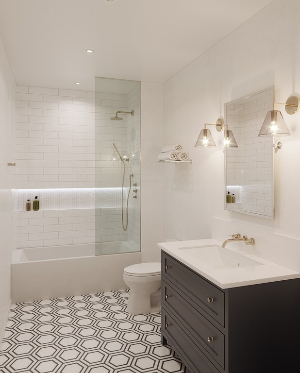 38 P Street, Unit 6 Boston, MA 02127 - Photo 5 of 10 a bathroom with a sink a toilet and shower