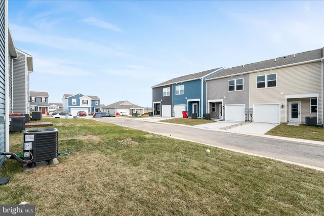 a view of a house with a sink and a yard