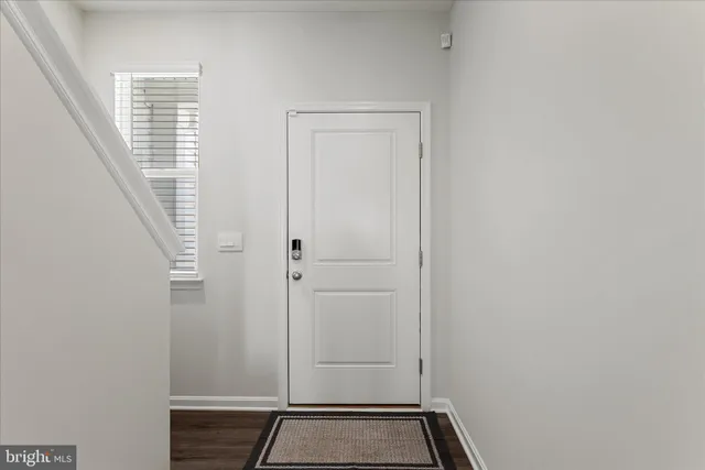 a view of an entryway with a window
