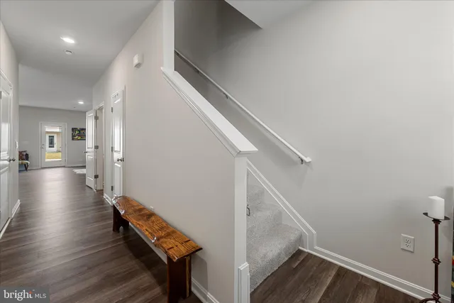 a view of entryway with wooden floor