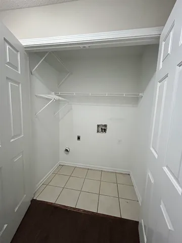 a view of an empty walk in closet
