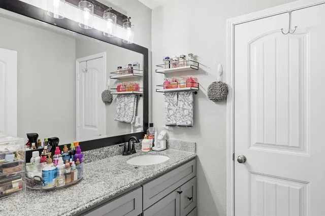 a view of a hallway with storage and utility