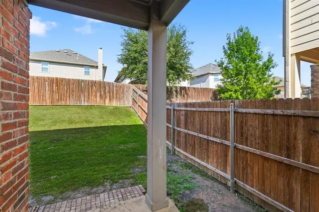 a view of a backyard with a garden