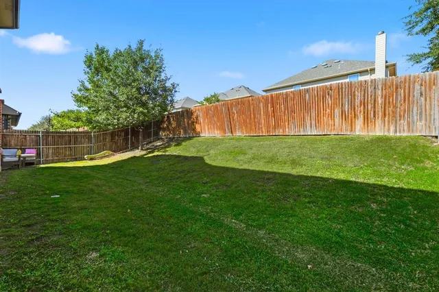 a view of a backyard with a garden