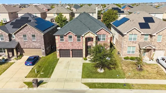a view of house with yard