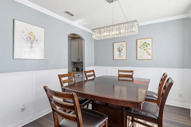 a view of a dining room with furniture