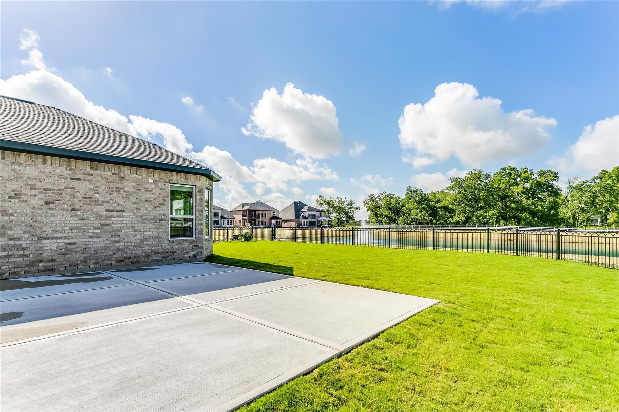 4227 Carol Ridge Drive Sugar Land, TX 77479 - Photo 30 of 35 a view of a swimming pool with an outdoor space and seating area