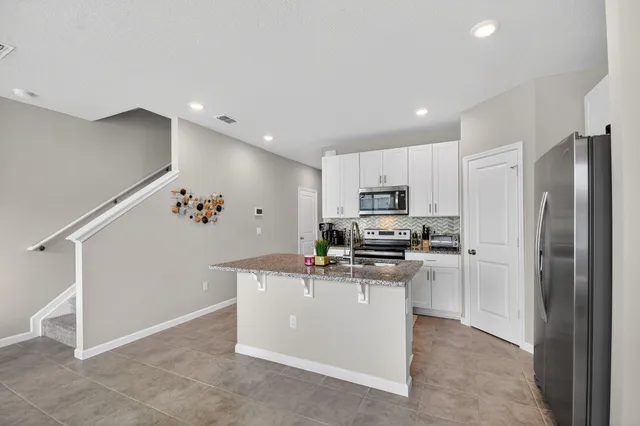 $410,000 | 5649 Mentmore Drive, West Palm Beach, FL 33407