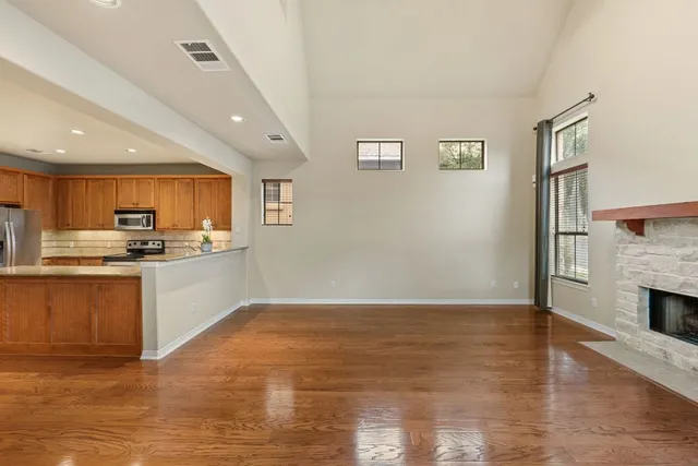 front view of a house with a tree
