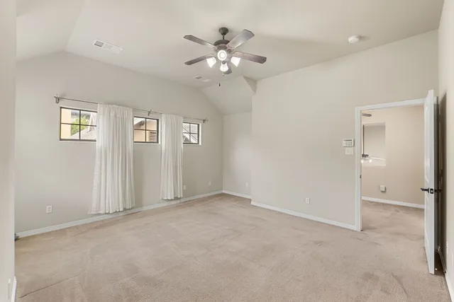 a view of a room with a wardrobe space