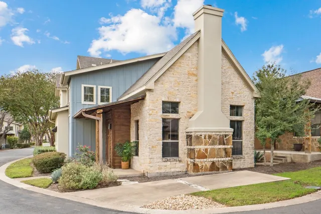a view of a hallway with a window