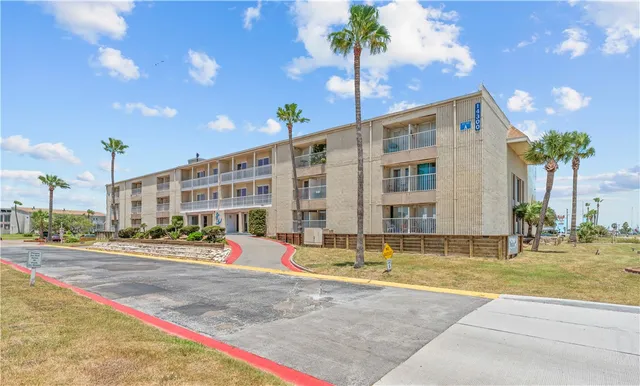 a front view of a building with street view