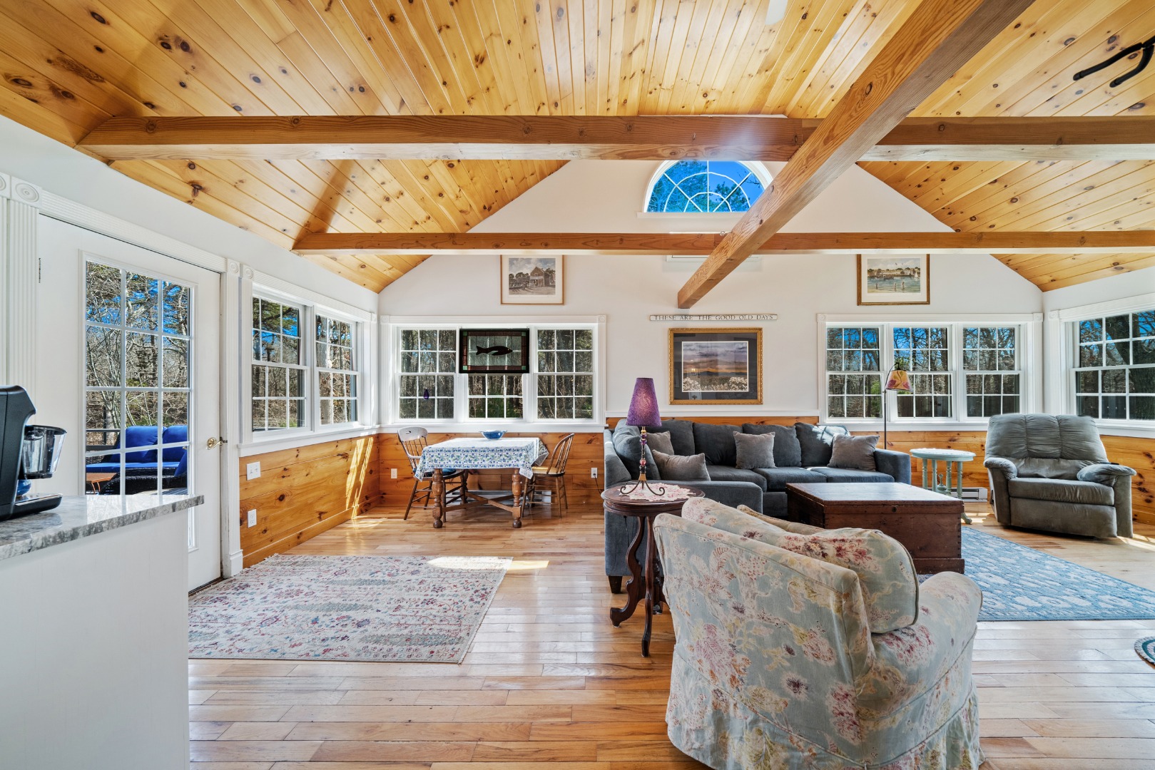 357 West Tisbury Road Edgartown, MA 02539 - Photo 3 of 33 a living room with furniture large windows and wooden floor