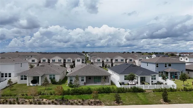an aerial view of multiple houses