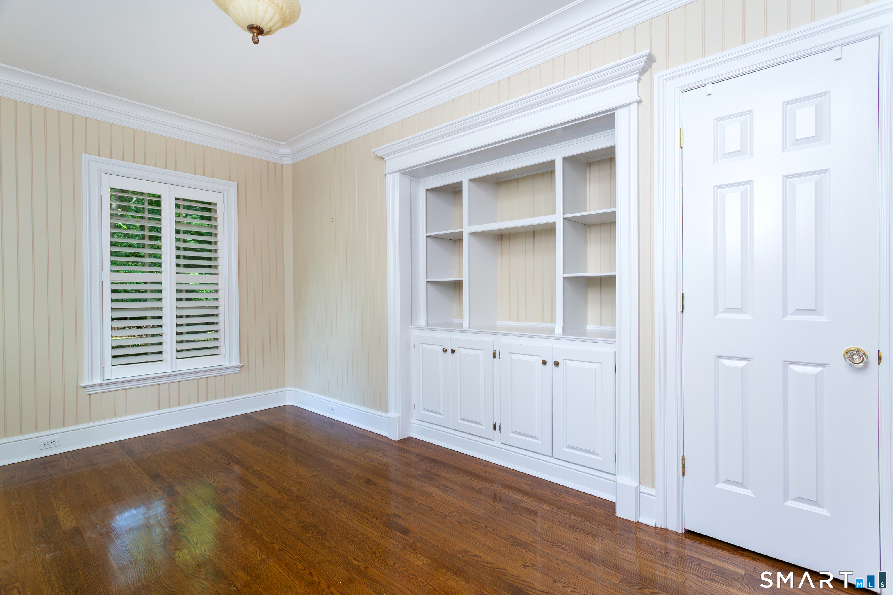 7 Old Hyde Road Weston, CT 06883 - Photo 13 of 40 Sitting room off kitchen w/ built ins