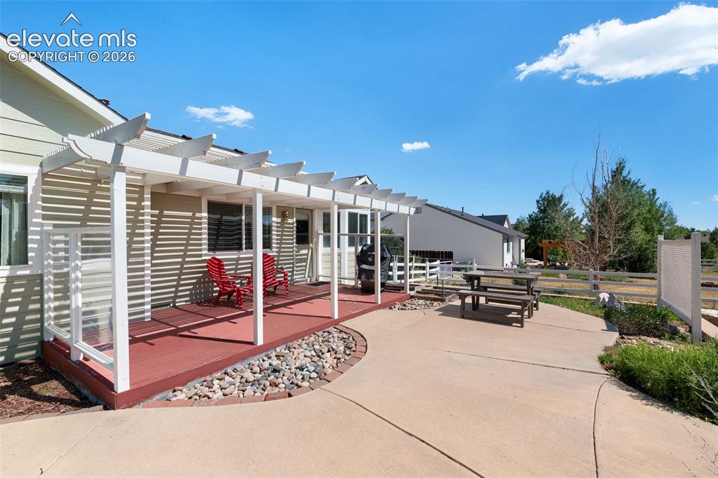 7840 Midnight Road Peyton, CO 80831 - Photo 44 of 48 Wonderful extended patio is great for entertaining and enjoying the expansive backyard