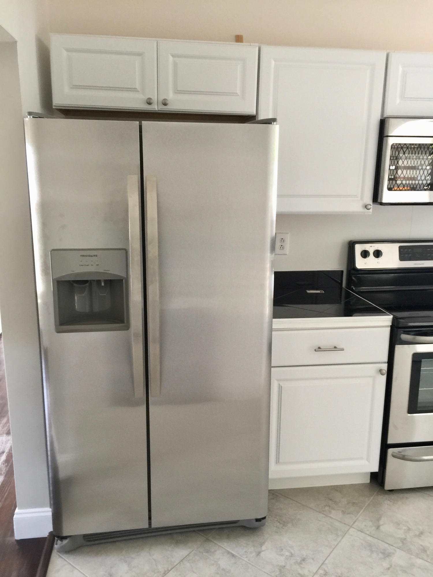 1007 Colonial Road Fort Pierce, FL 34950 - Photo 35 of 36 STAINLESS FRIDGE