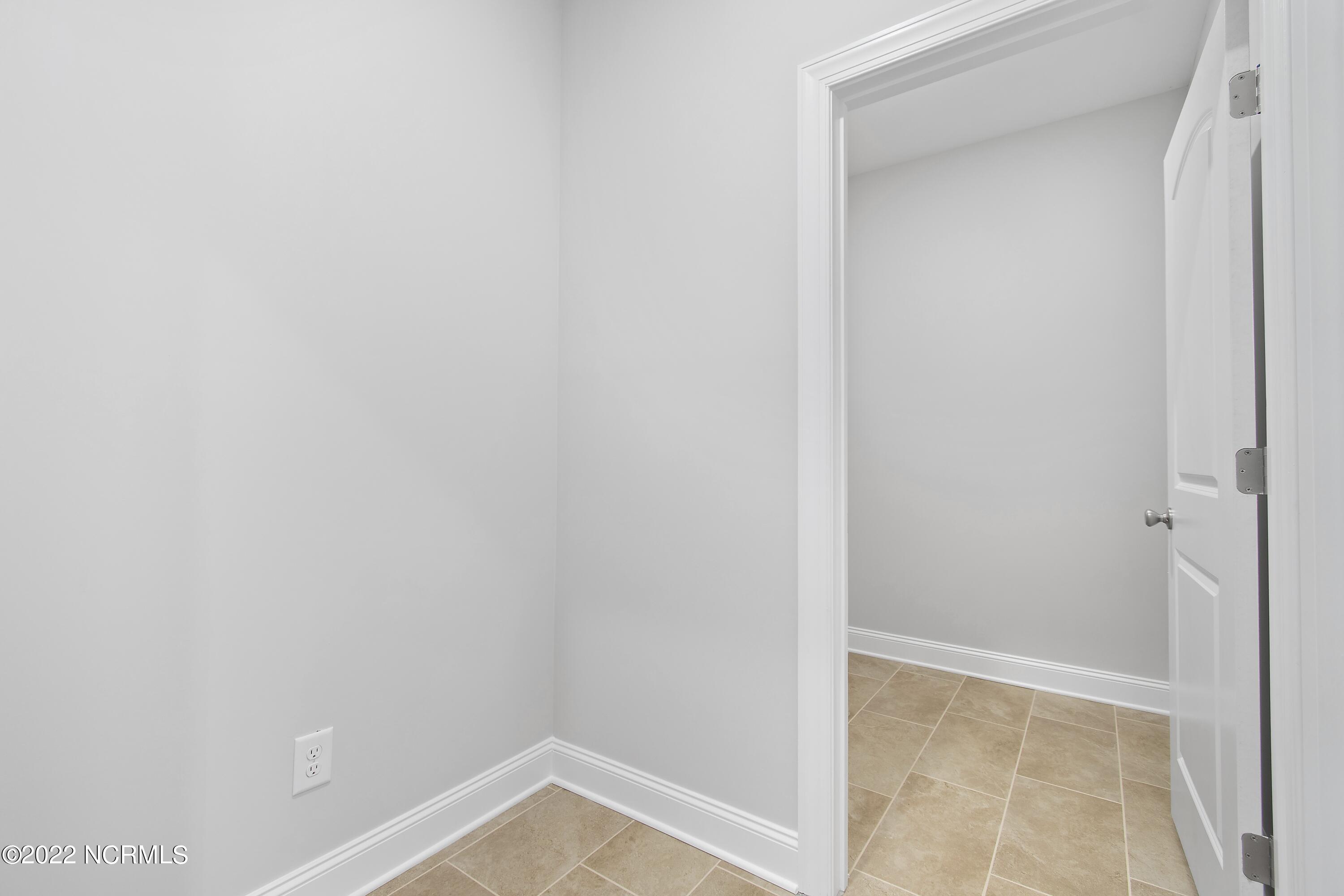 1574 East Boiling Spring Road Southport, NC 28461 - Photo 29 of 58 Previously Built Home Picture is a representation of what is to be built. Colors and finishes will vary and are subject to change.