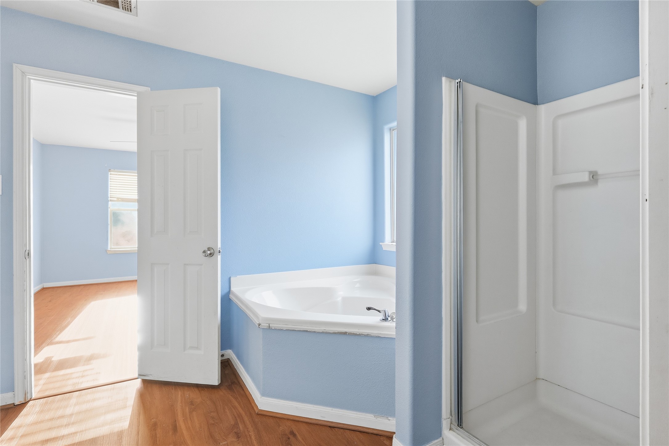 28807 Trinity River Drive Spring, TX 77386 - Photo 22 of 28 a bathroom with a tub and sink