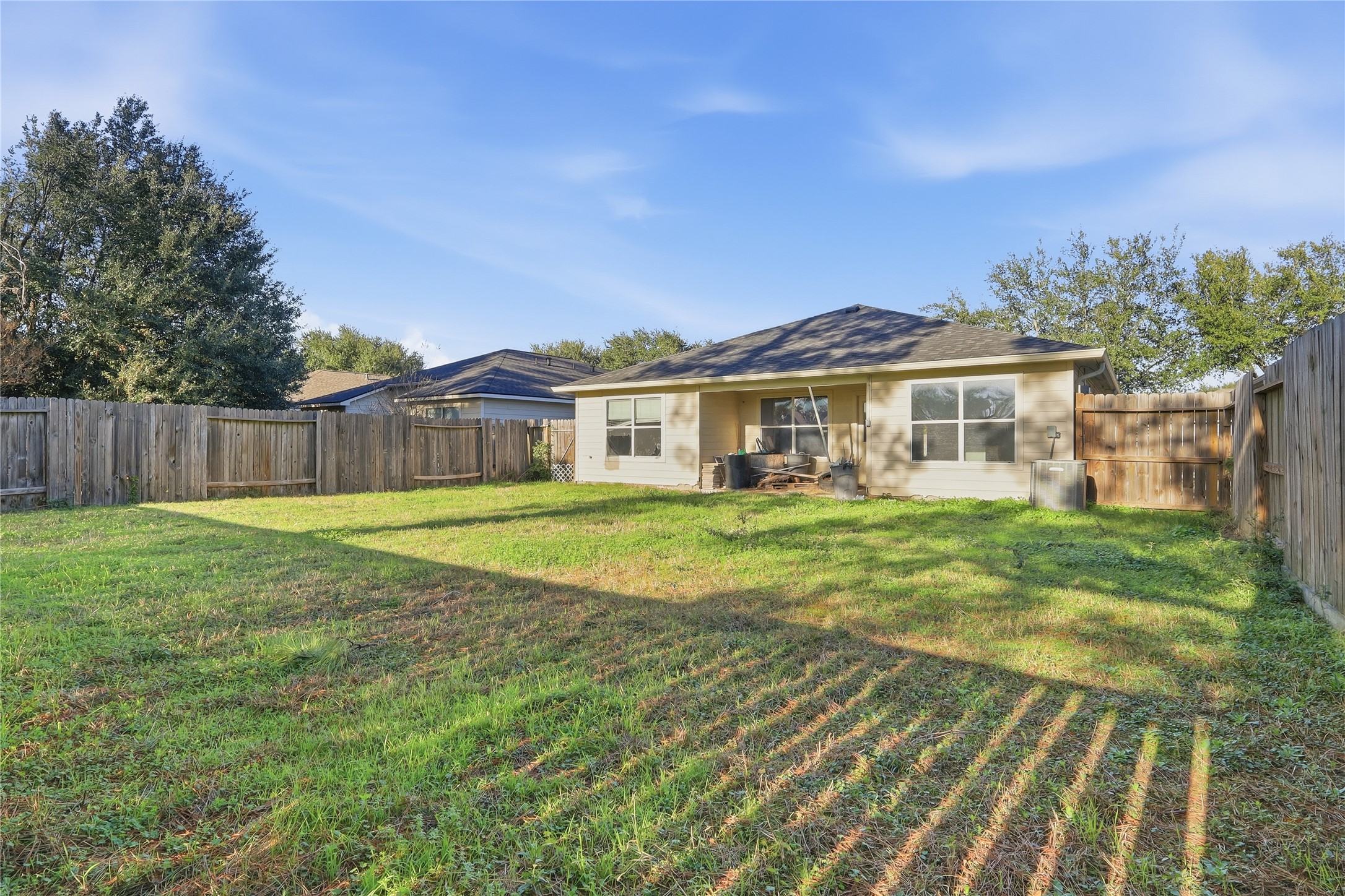 28807 Trinity River Drive Spring, TX 77386 - Photo 26 of 28 a view of a house with a big yard and large trees