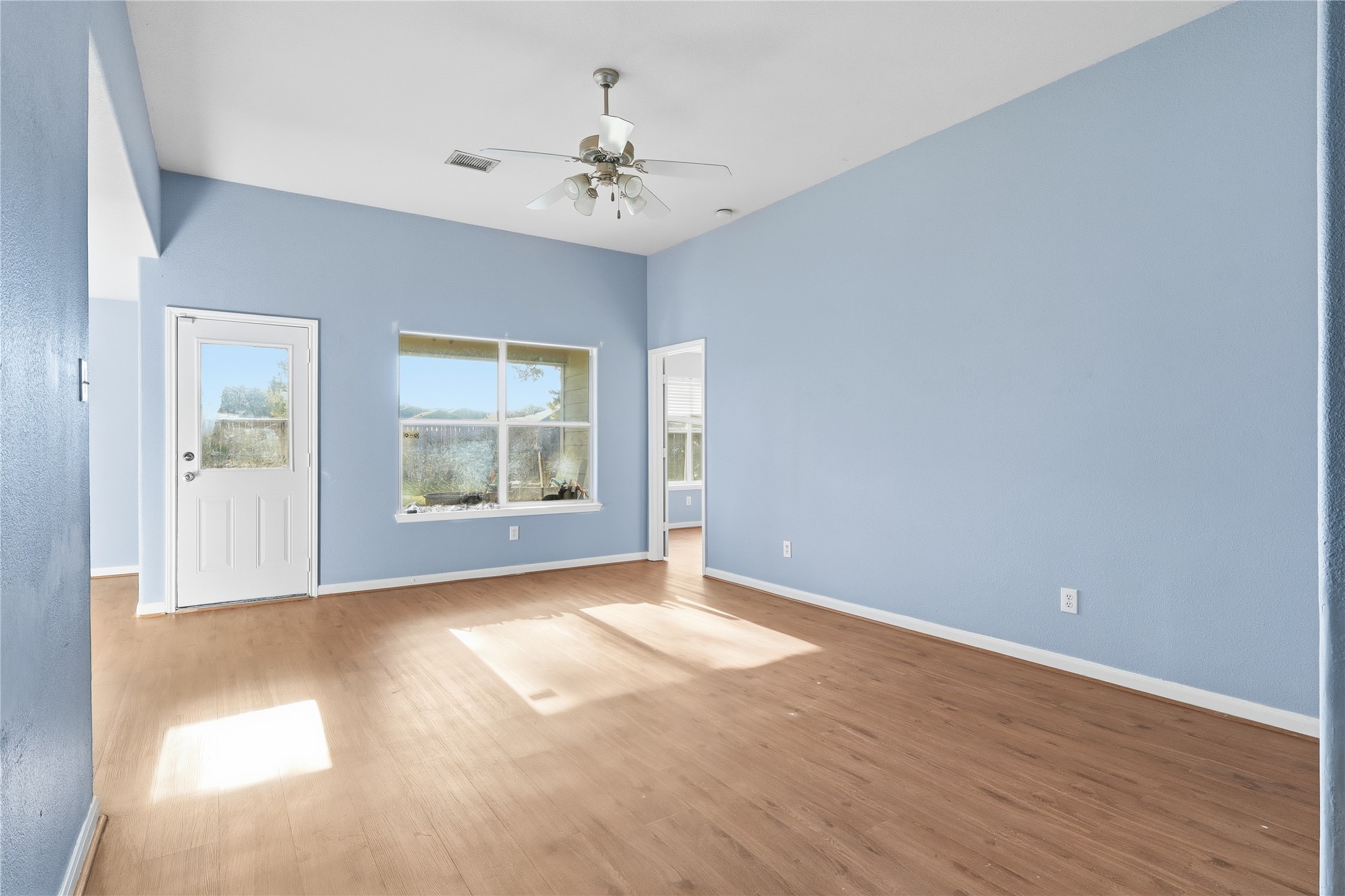 28807 Trinity River Drive Spring, TX 77386 - Photo 5 of 28 a view of an empty room with a window