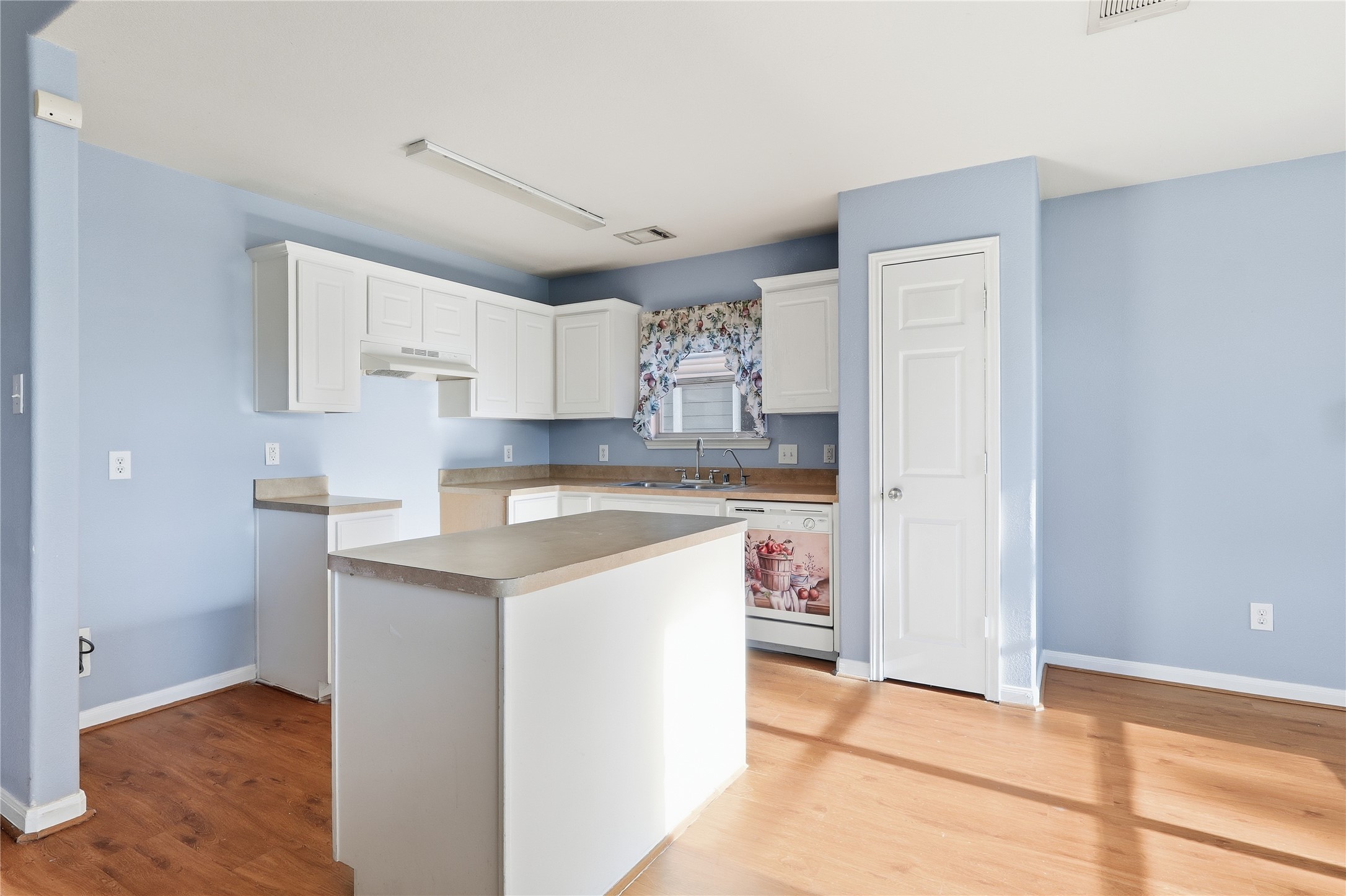 28807 Trinity River Drive Spring, TX 77386 - Photo 8 of 28 a kitchen with granite countertop a sink cabinets and stainless steel appliances