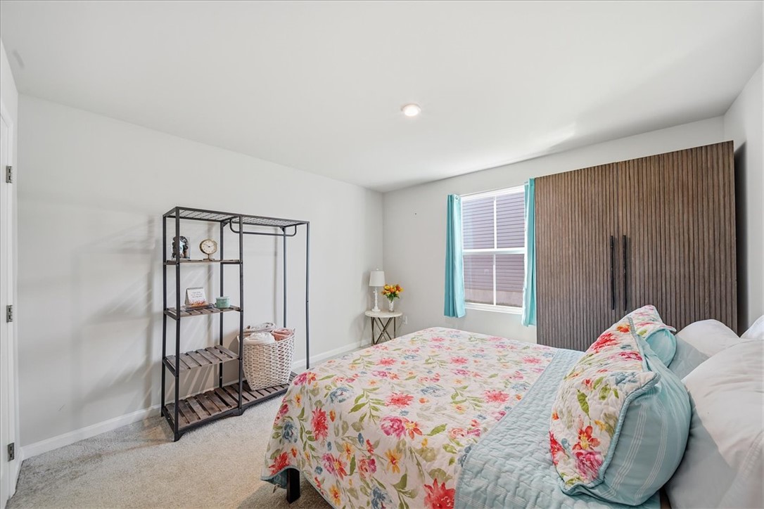 117 Alice Court Easley, SC 29642 - Photo 14 of 26 A comforting retreat, this room offers plush carpeting and a naturally lit window.