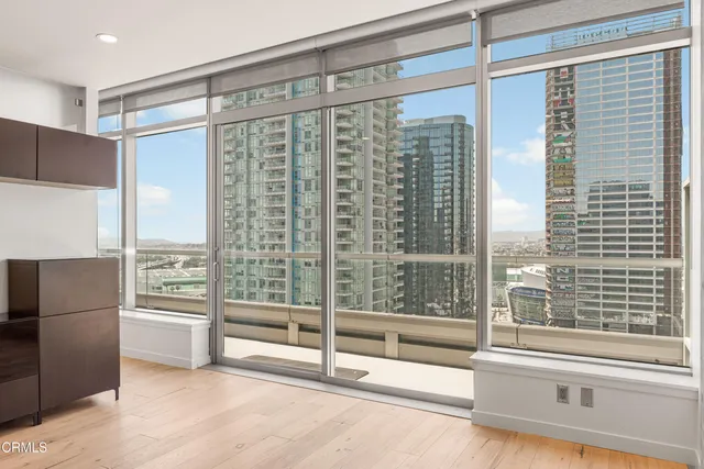 a view of a room with a large window