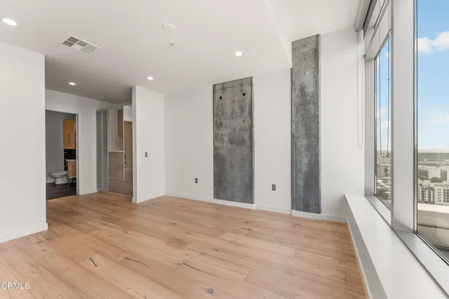 a view of a living room and floor
