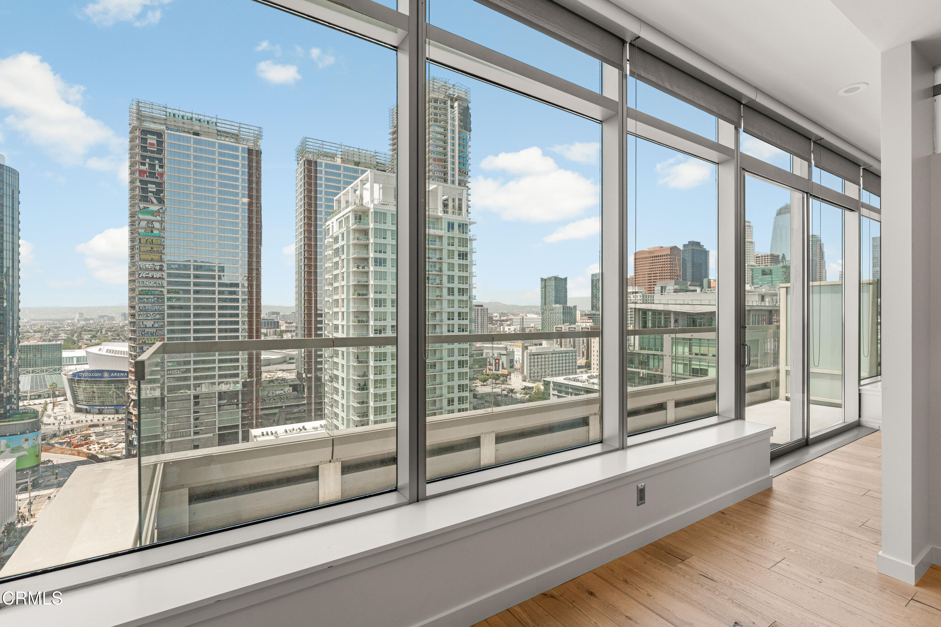 1155 South Grand Avenue, Unit 2106 Los Angeles, CA 90015 - Photo 28 of 51 a view of a city from a living room