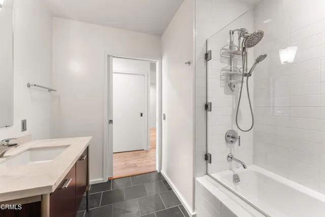 a view of parking space with parked cars