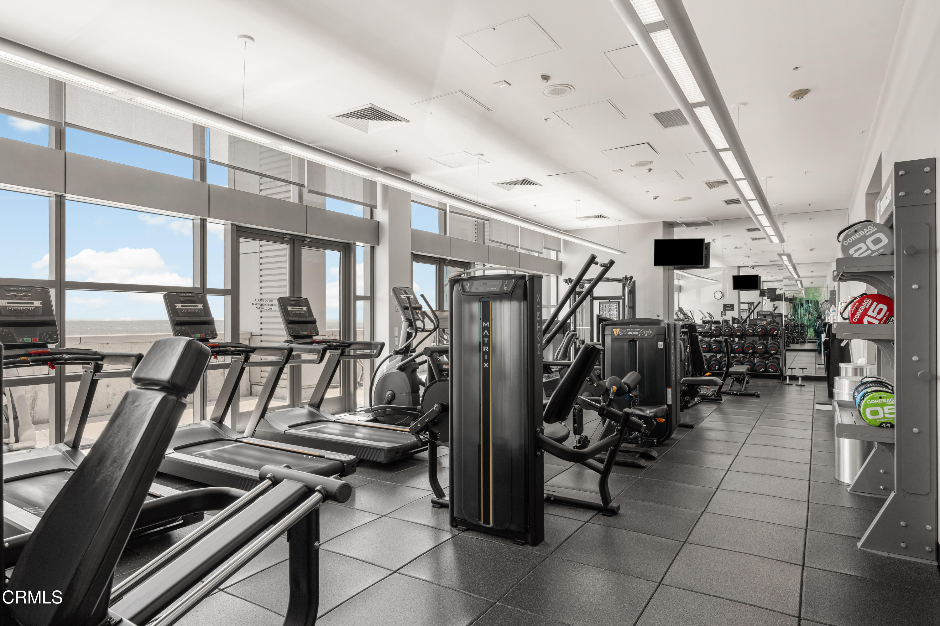 1155 South Grand Avenue, Unit 2106 Los Angeles, CA 90015 - Photo 36 of 51 a view of a room with gym equipment