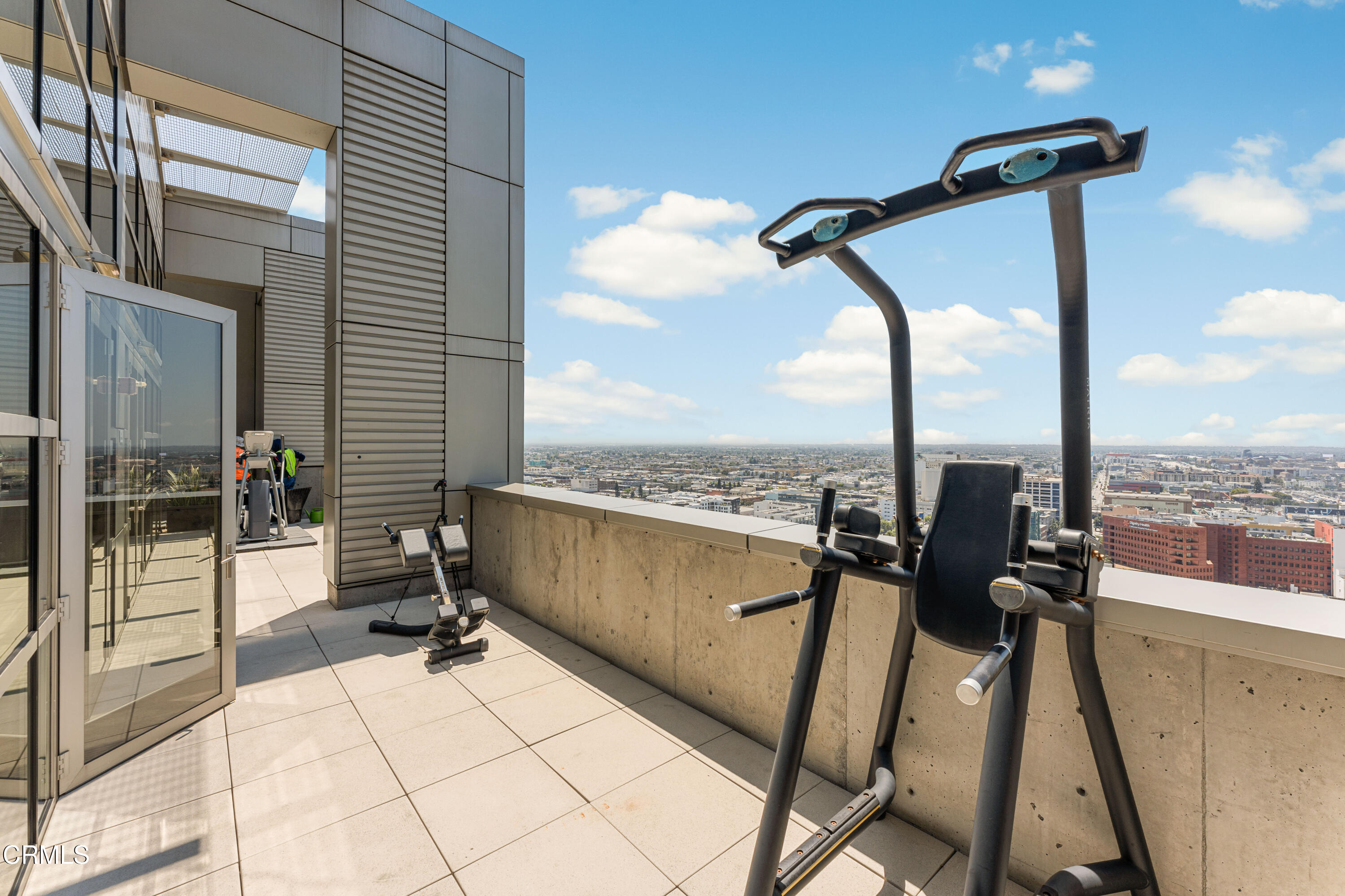 1155 South Grand Avenue, Unit 2106 Los Angeles, CA 90015 - Photo 38 of 51 a view of a terrace with furniture and city view